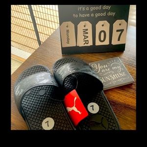 SOLD PUMA SLIDES